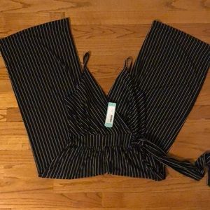 Black pin stripped romper with pockets.